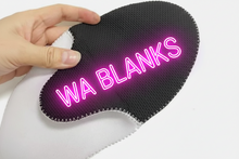 Load image into Gallery viewer, Black shoe insert held by a hand on a white background